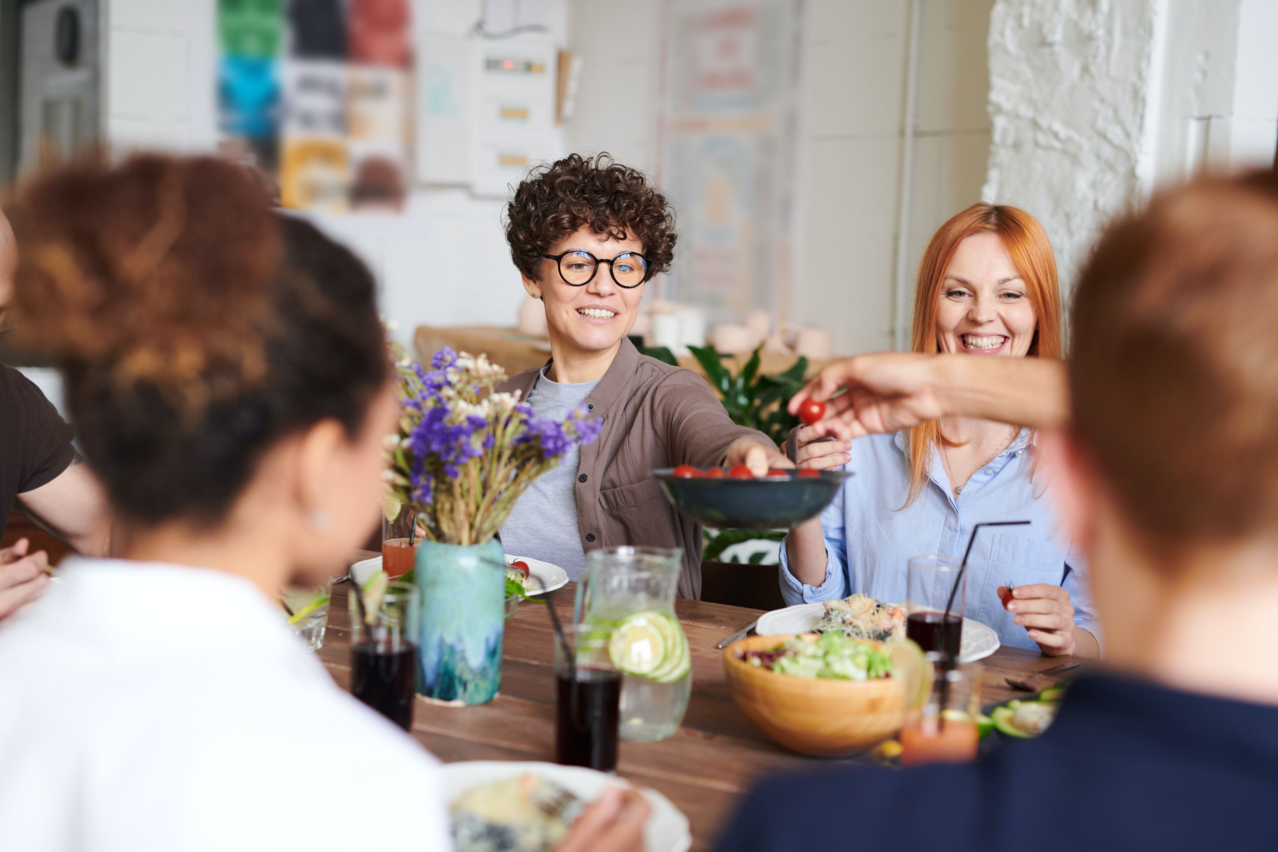 People sharing food at a dining table